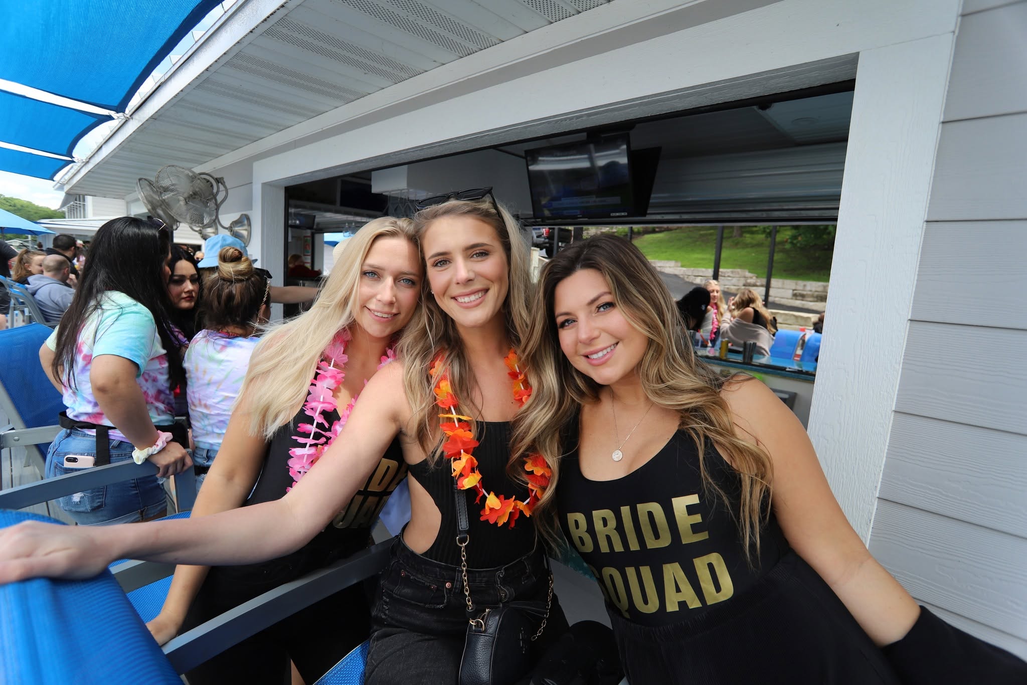 A bride and friends celebrating at Boathouse