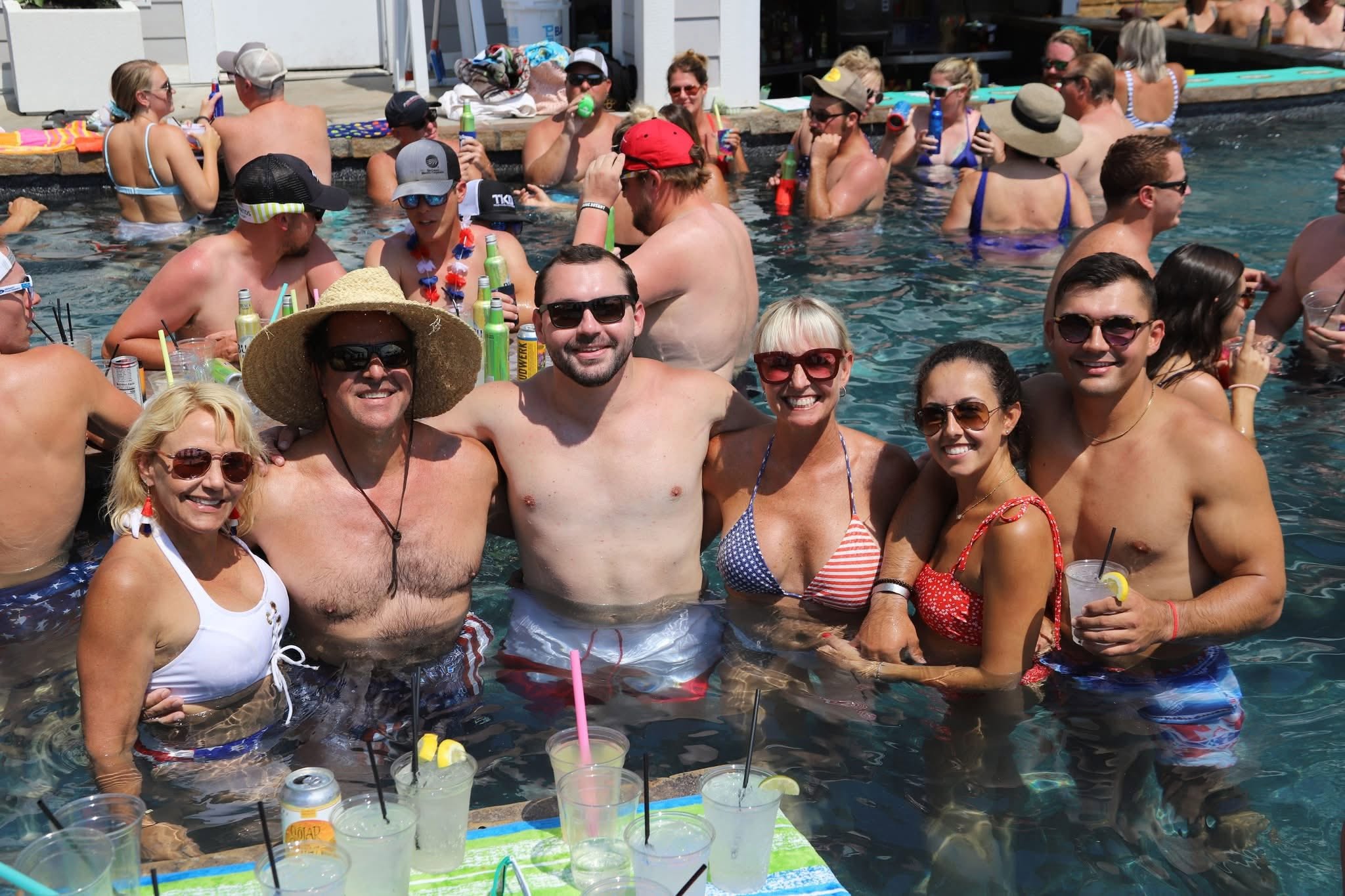 Family and friends gathered together in the Boathouse pool